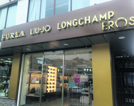 Luxury handbag store opens today